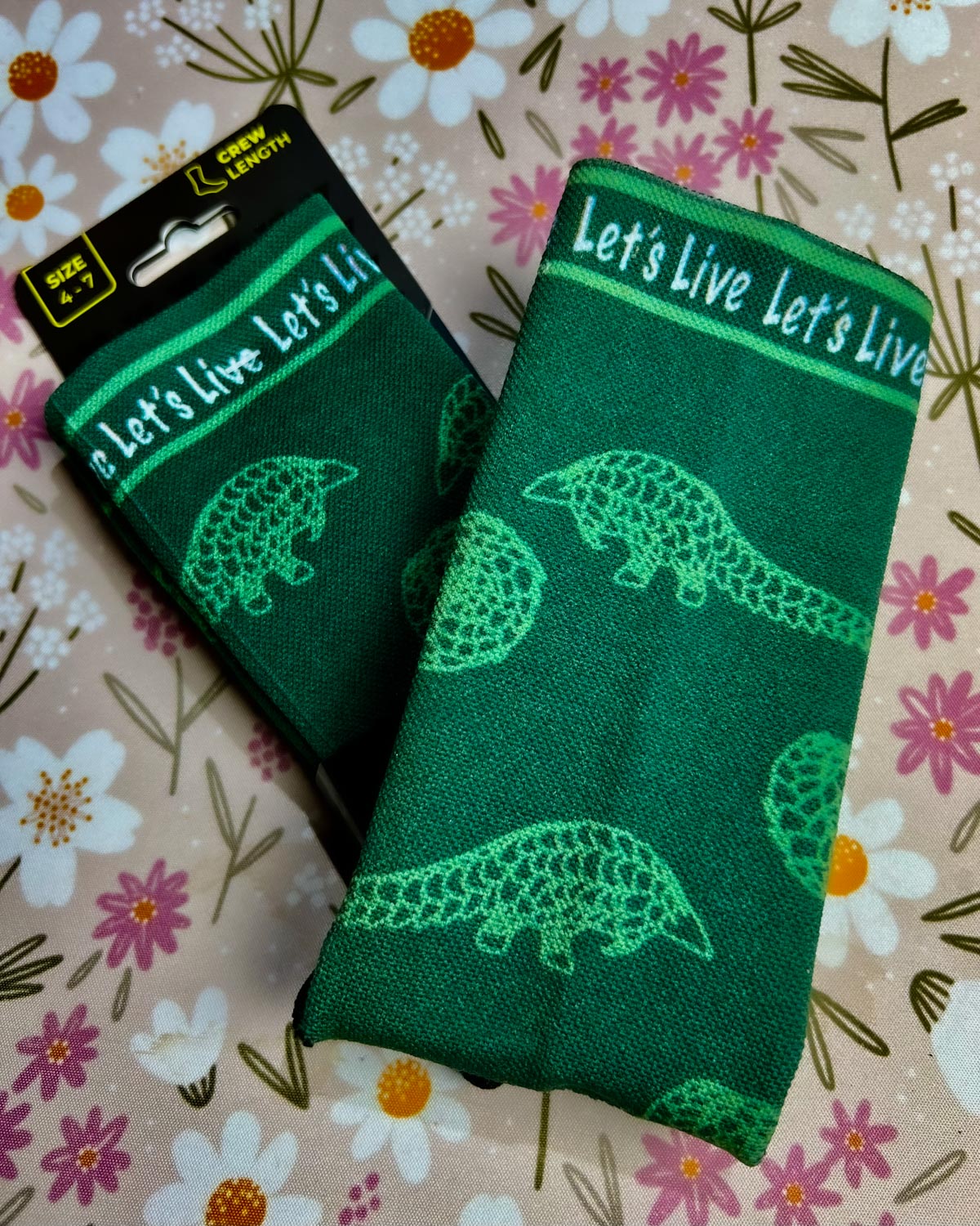 Lets Live Pangolin Socks with Versus branding