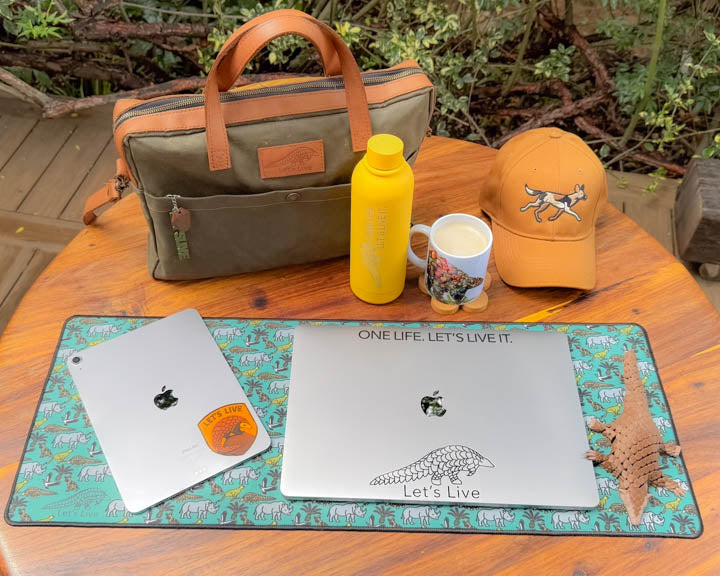 Let's Live deskpad, pangolin and sticker on a desk