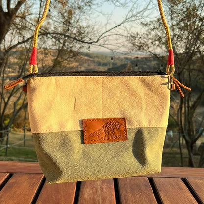Green and Beige handbag with a leather Let's Live Pangolin patch