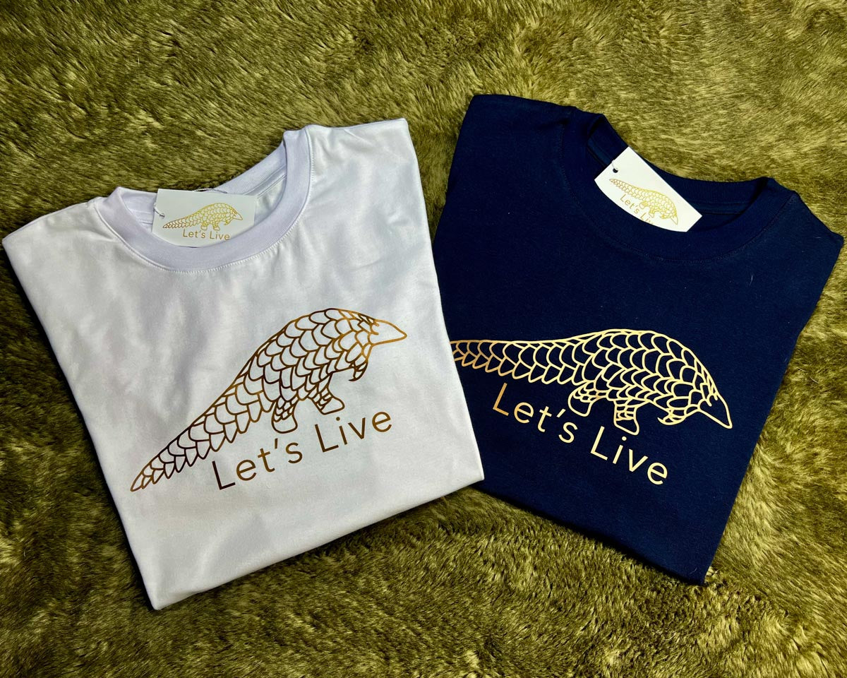 White and Navy Blue folded Let's live Pangolin T-shirts